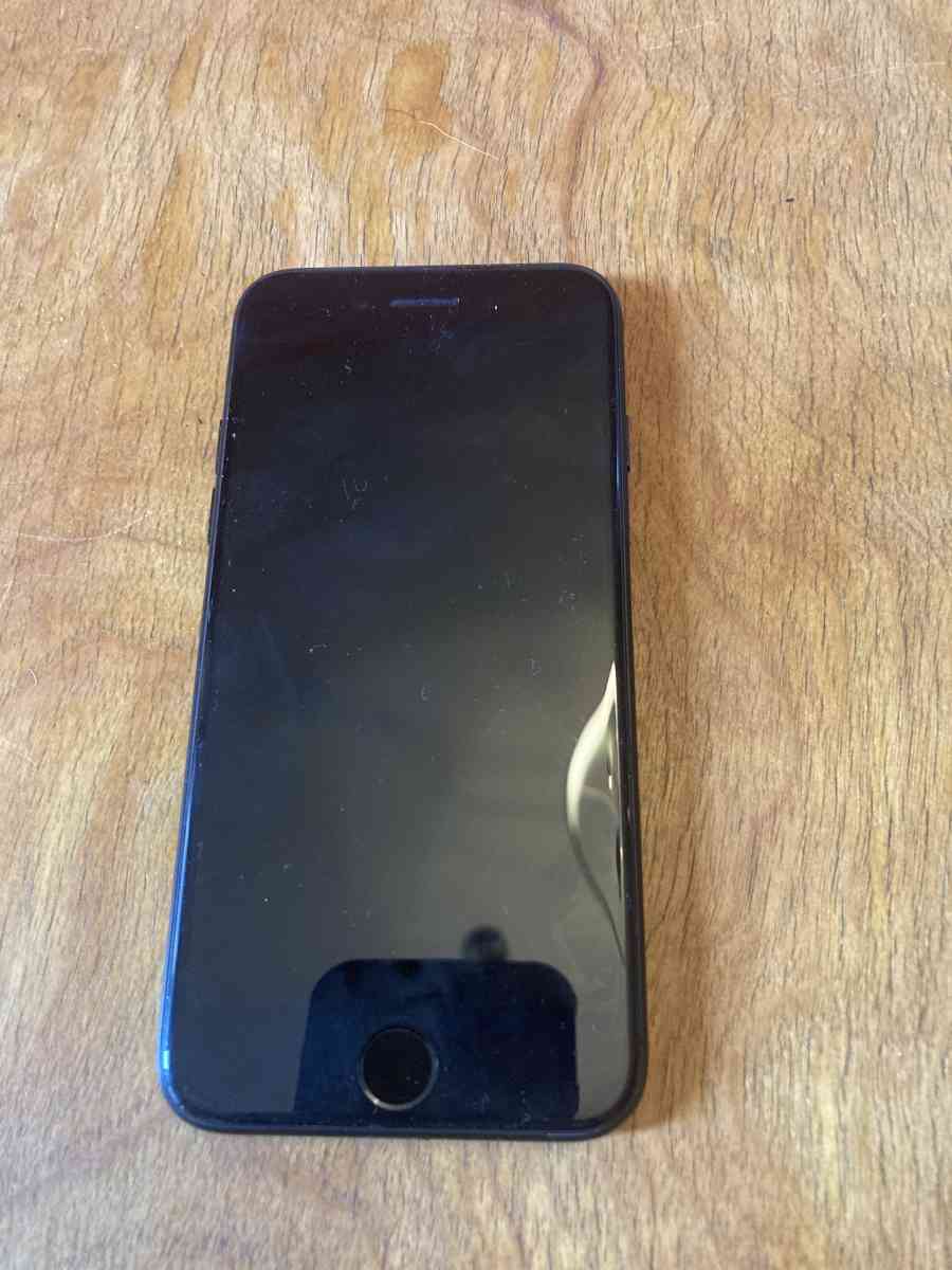 iPhone 7 with case and charger