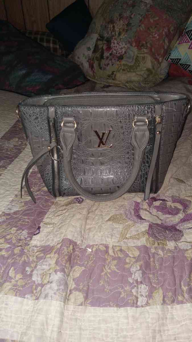 Louis Vuitton grey handbag with crocodile pattern