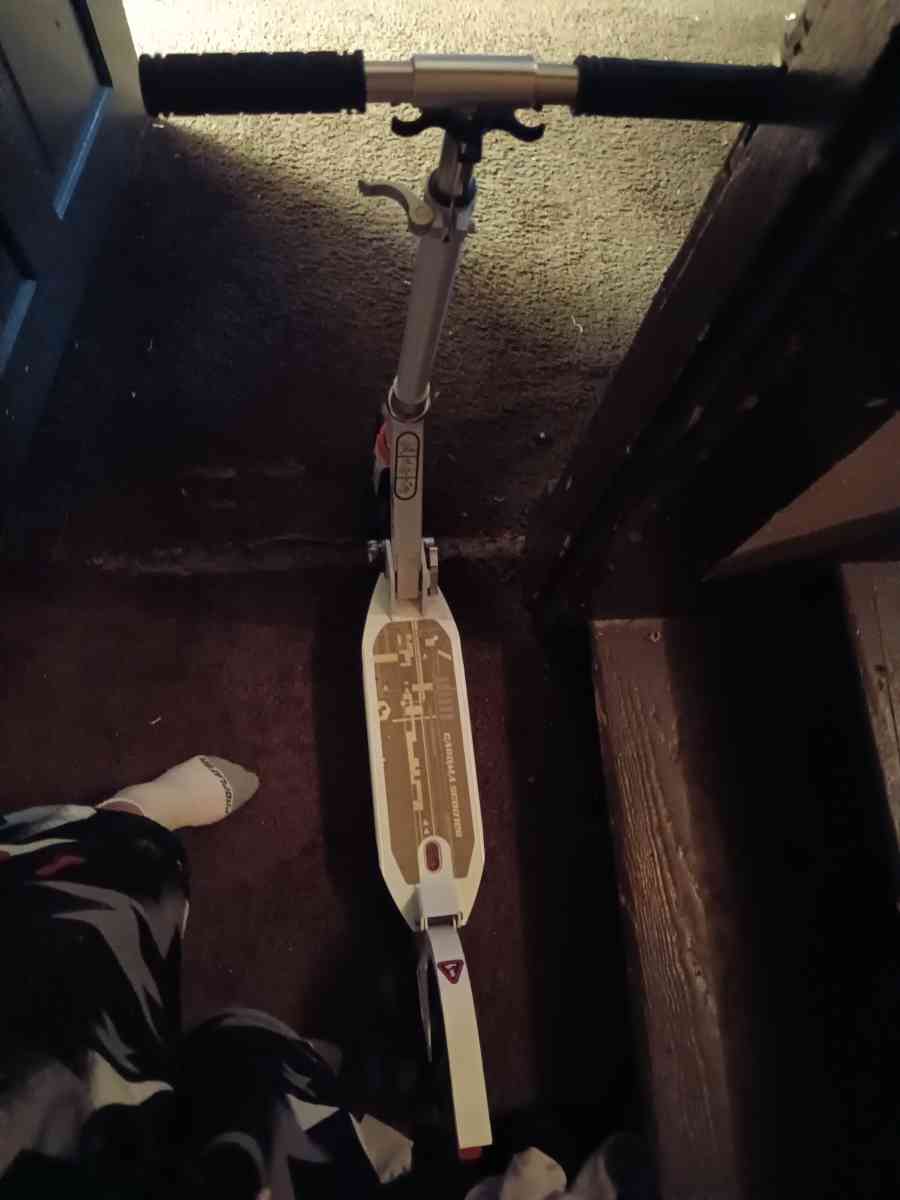 black grey and white scooter