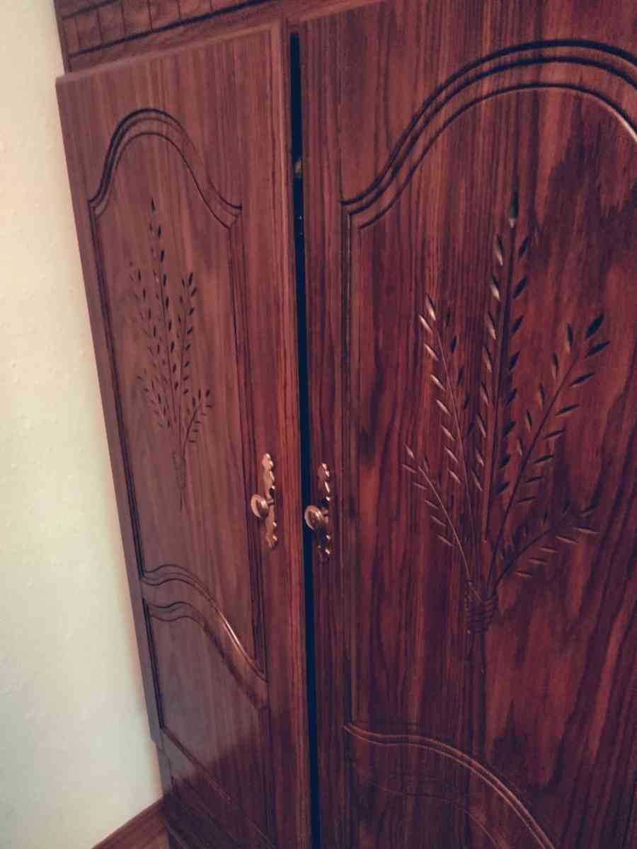 wooden armoire closet