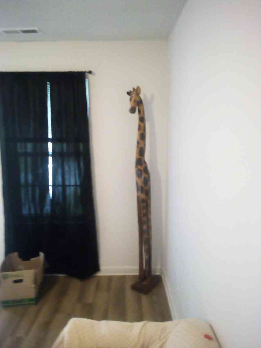 7 foot tall wooden giraffe