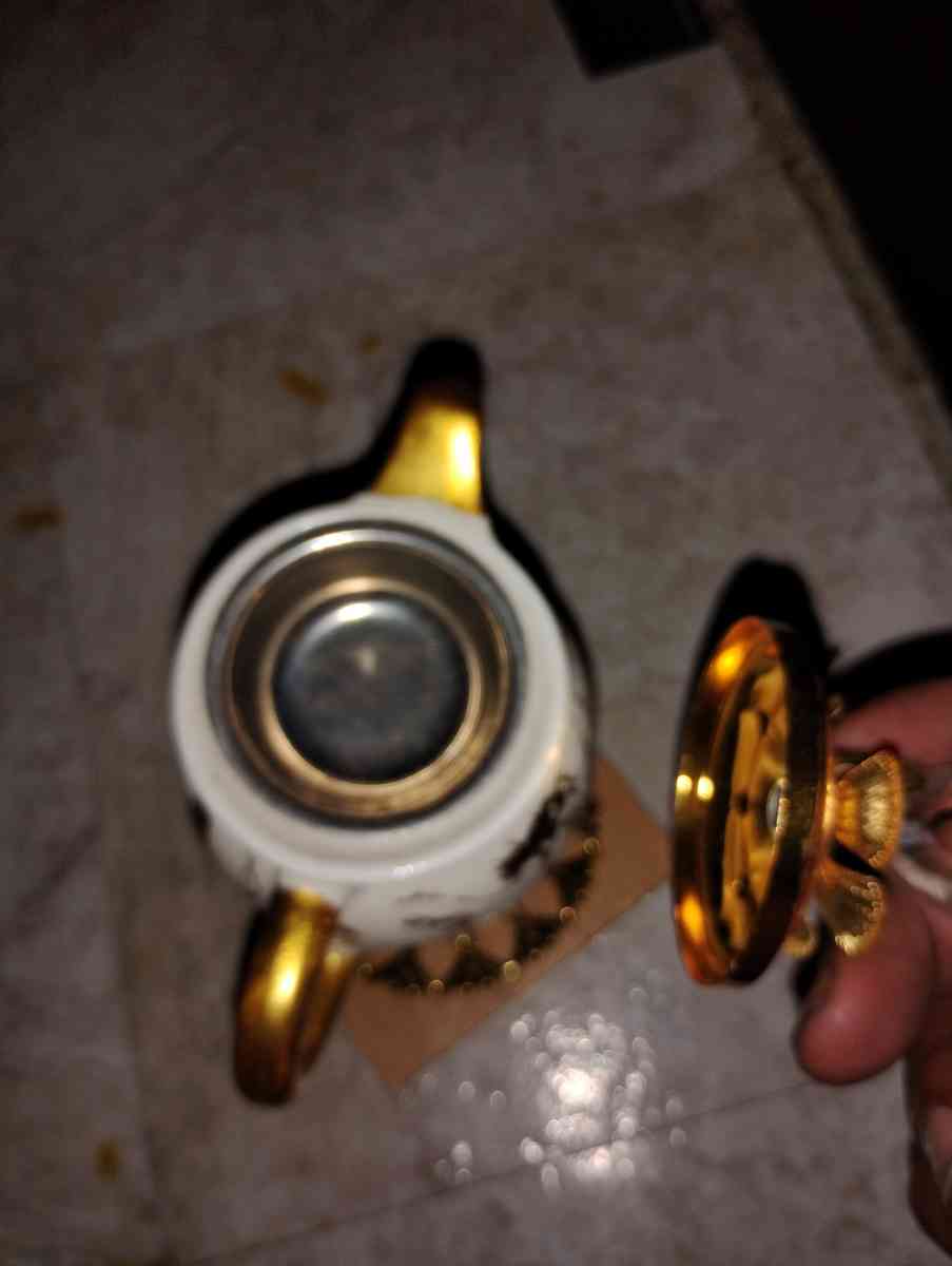 gold and white teacup