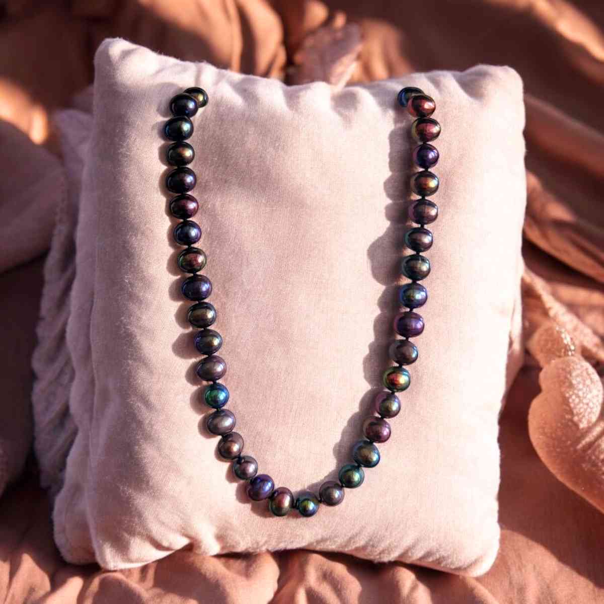 Black fresh water Pearls in 14 kt gold necklace