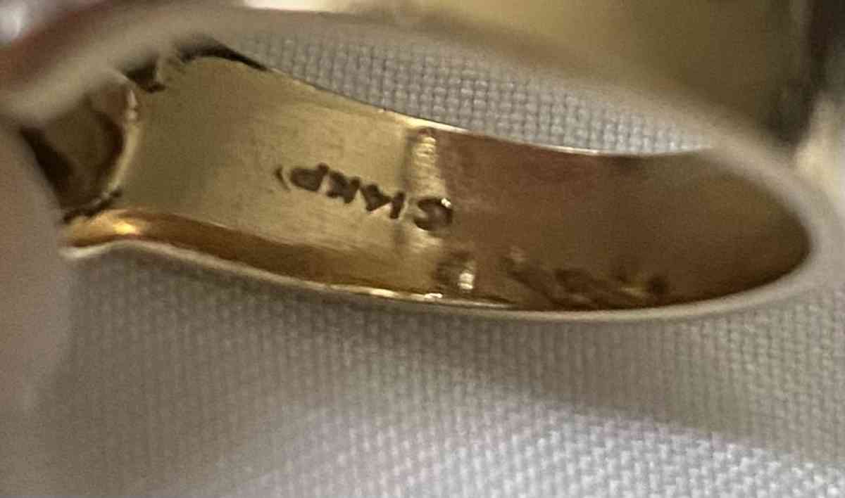 Custom made 14 karat gold diamond ring