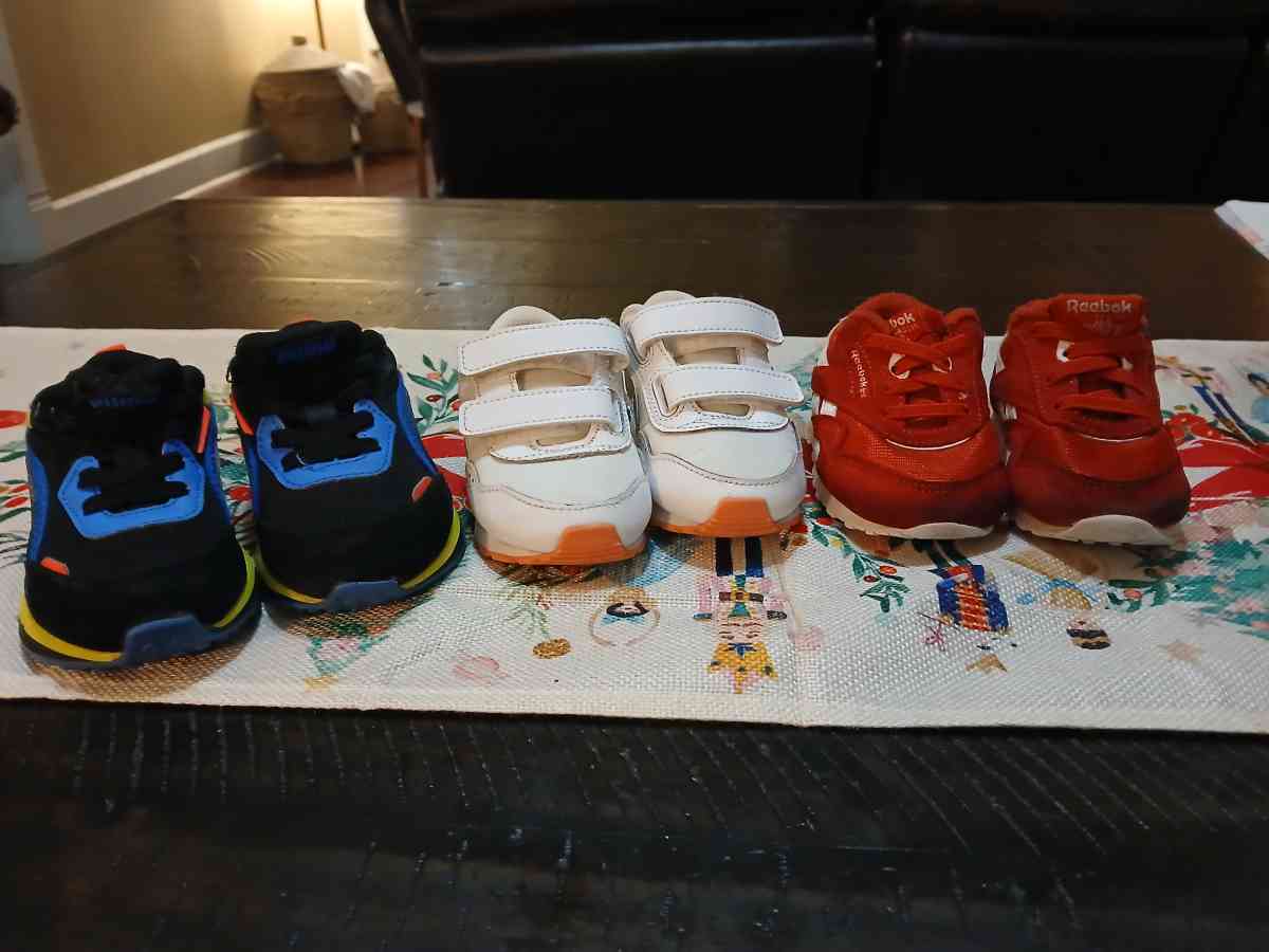 Lot of baby shoes Nike Reebok and Puma 4C