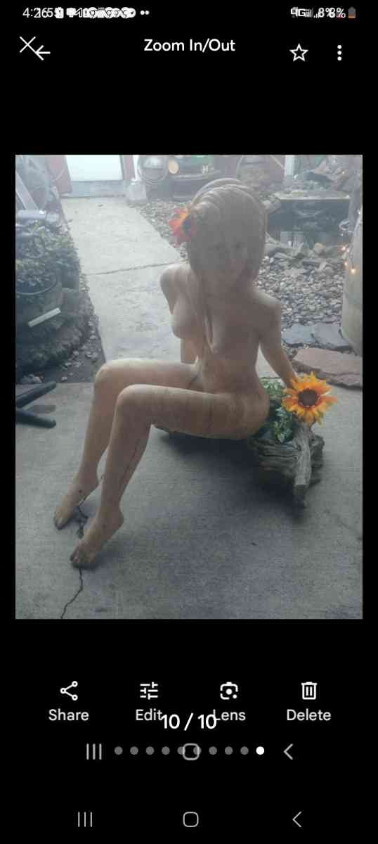 lifesize hand  chainsaw wood woman