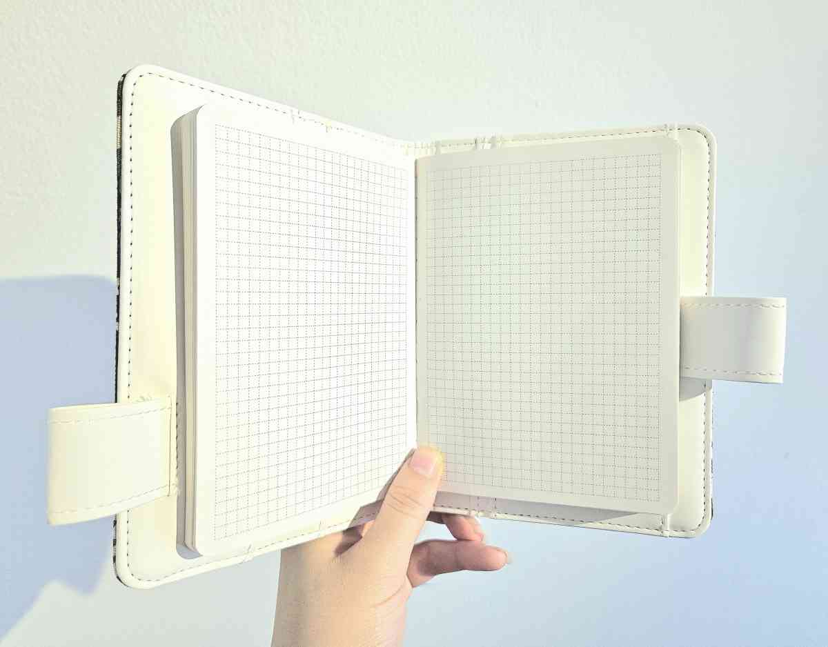 Item Small Fabric Covered Gridded Journals