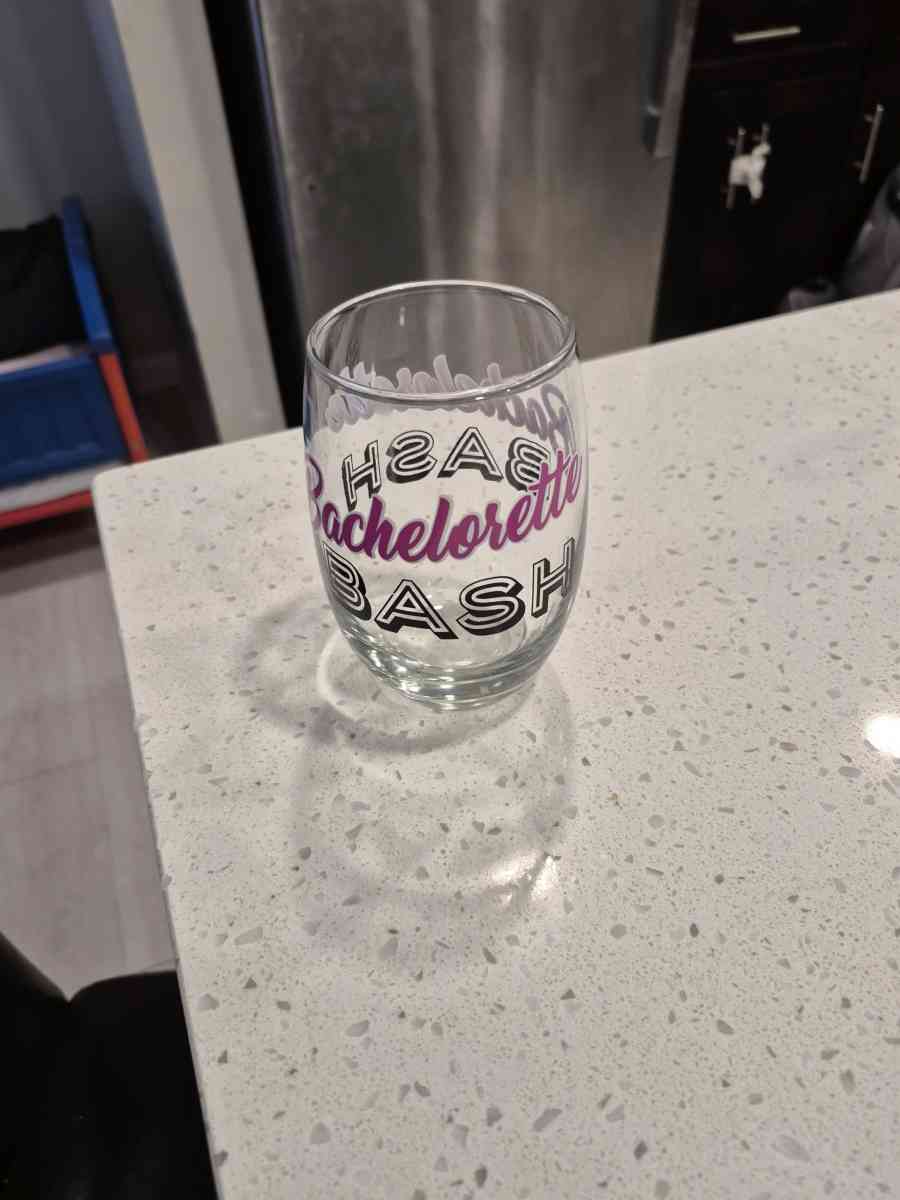 ironing board and iron and celebration glass