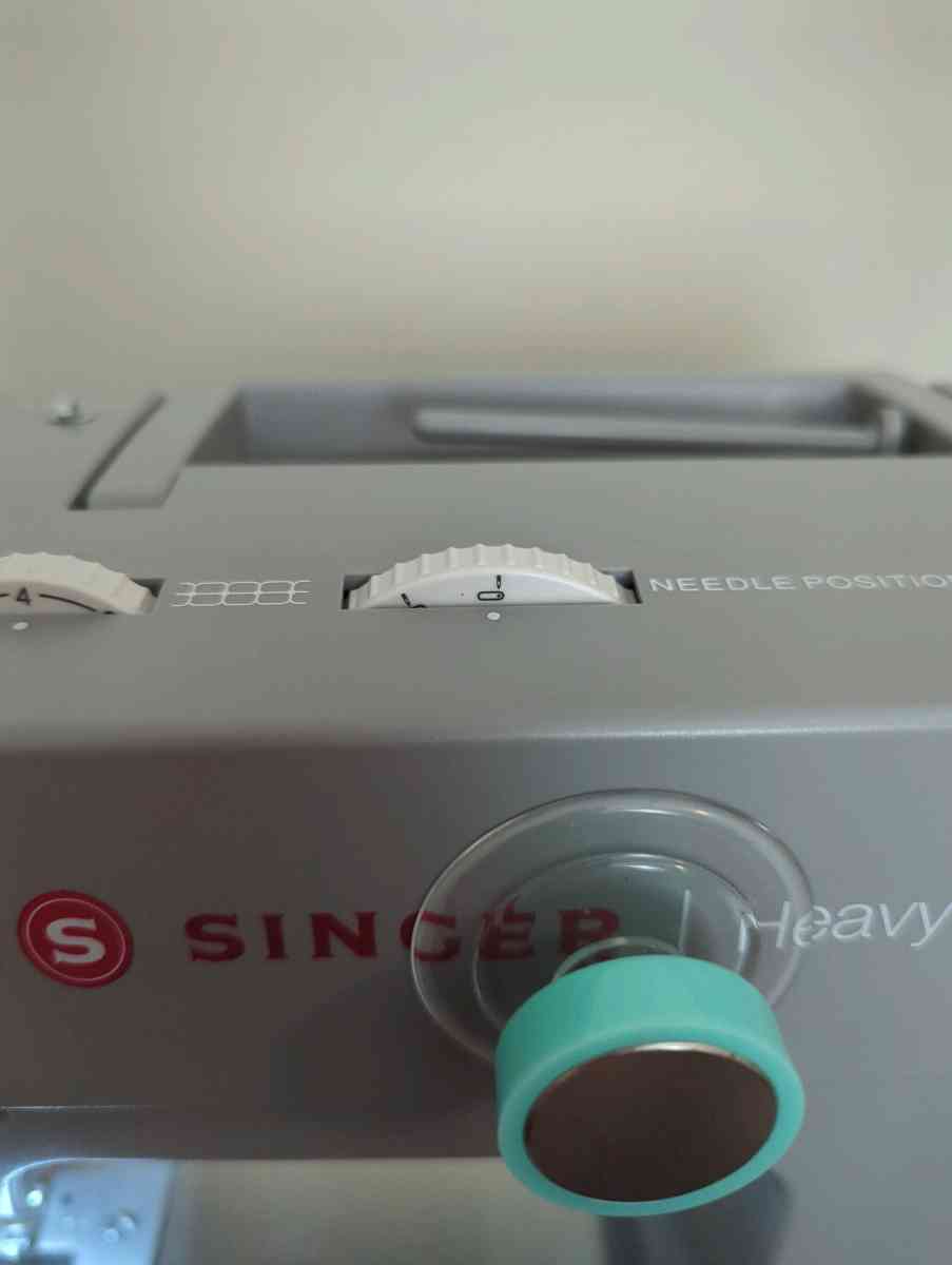 heavy duty Singer sewing machine with table extension