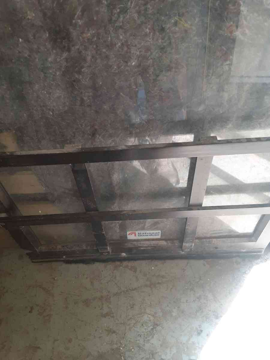 Commercial glass door with hinges but no frame