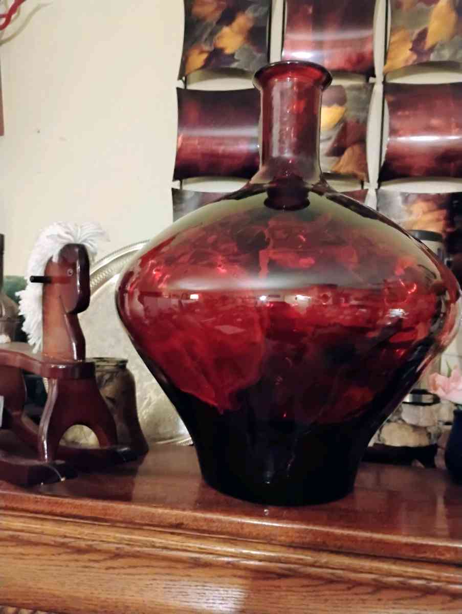 large red quality  glass bottle very heavy
