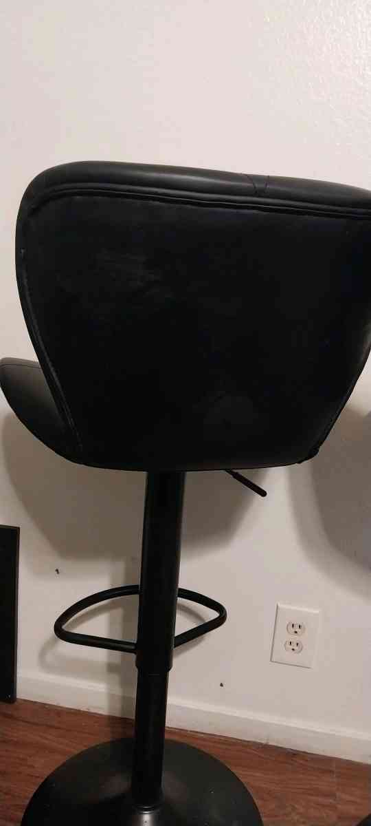 2 black barstools adjustable height