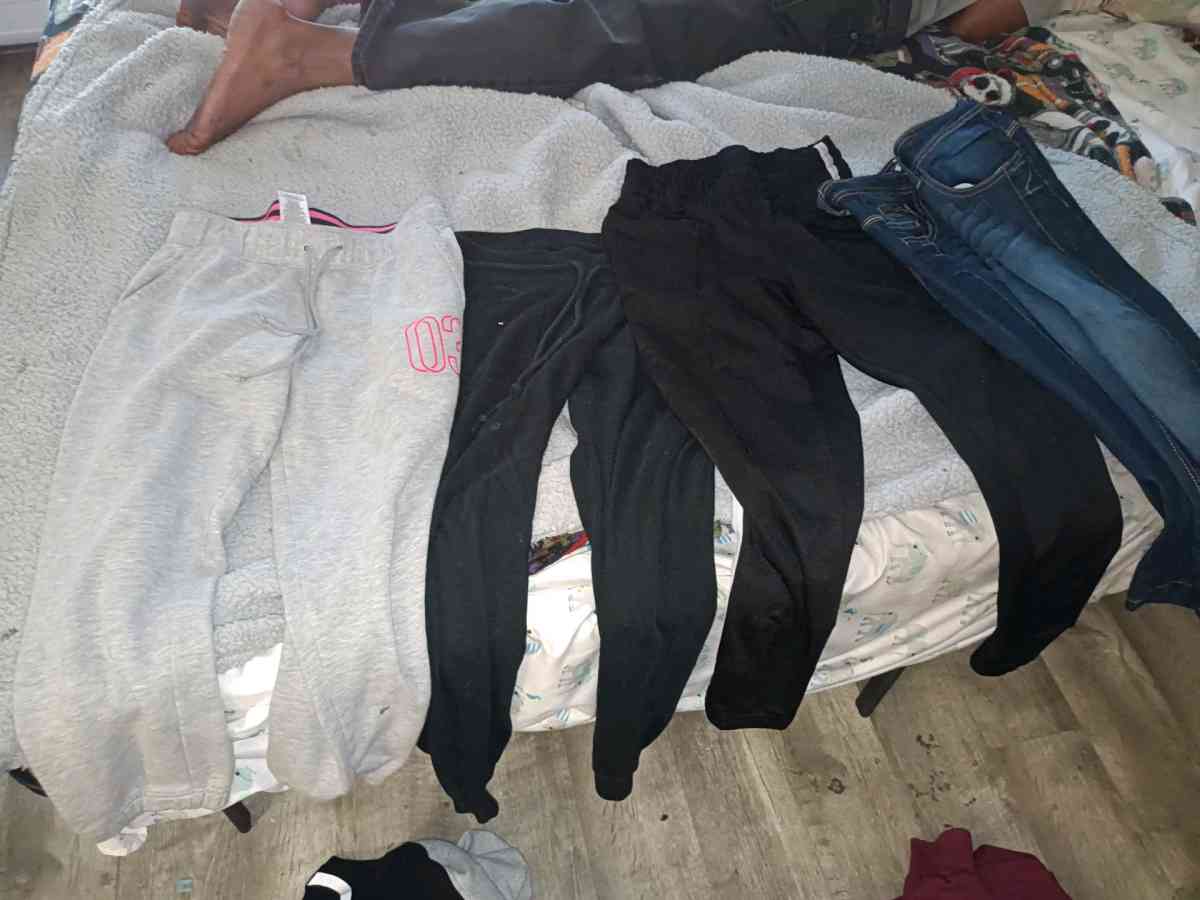 assorted joggers and scrubs