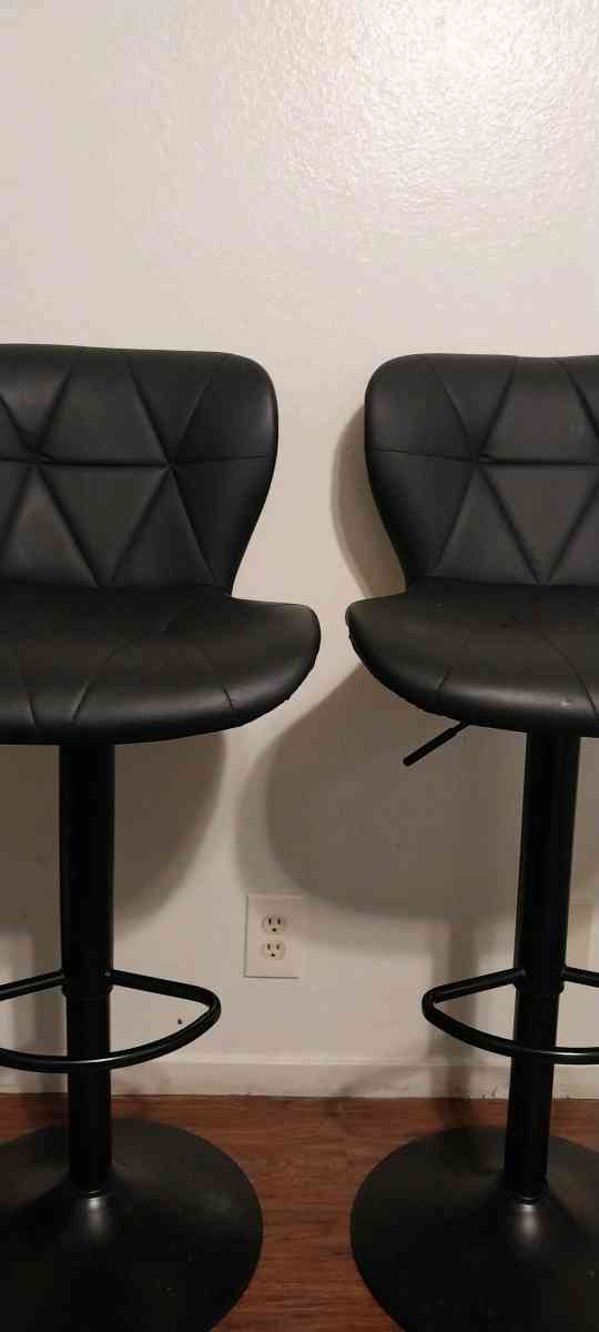 2 black barstools adjustable height
