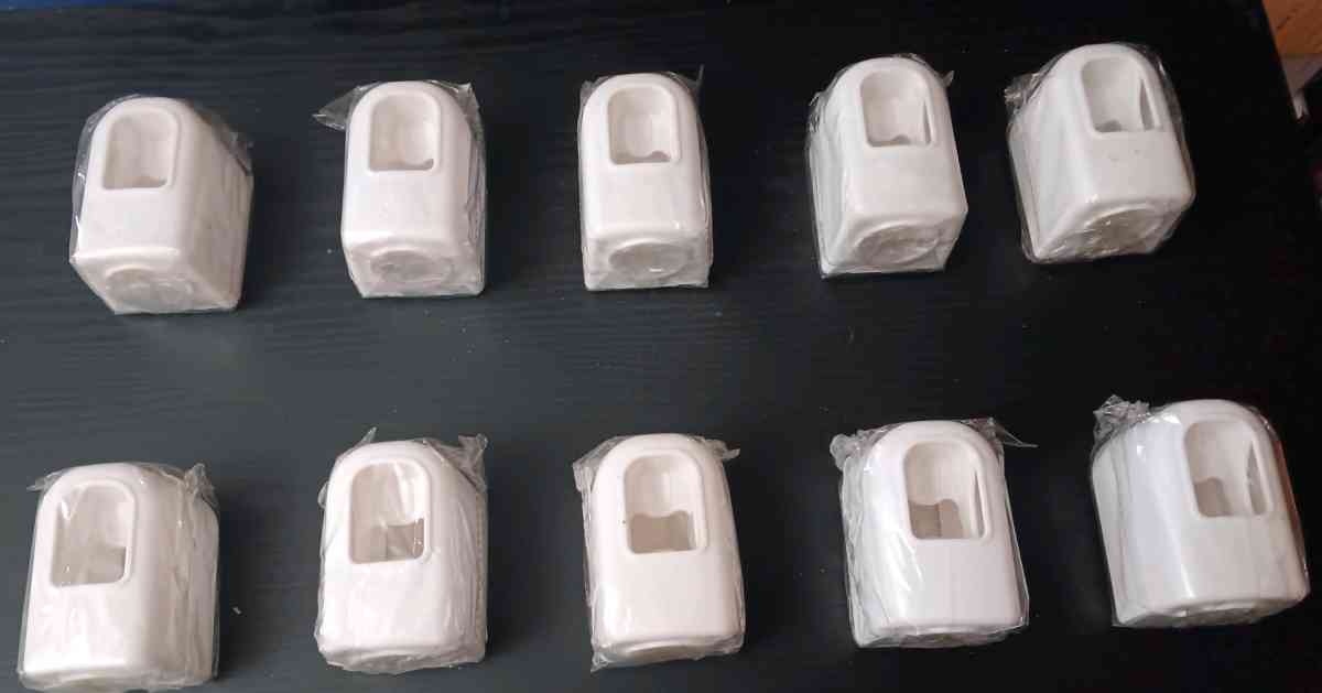 TOOTHPASTE HOLDERS