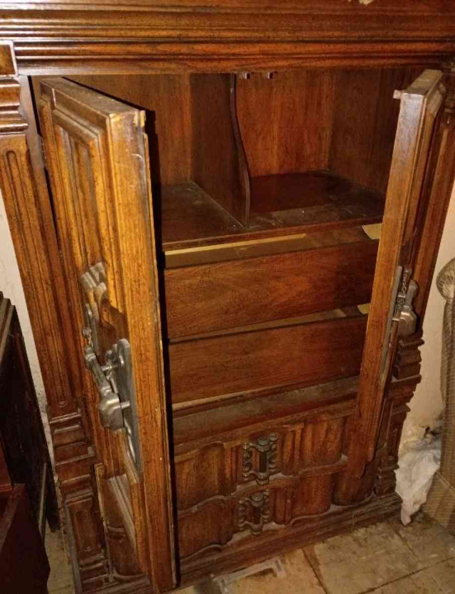 antique wooden cabinet with decorative designs