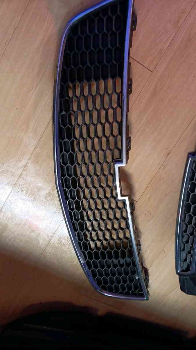 OEM GM Chevy Cruze front grill and shock absorber