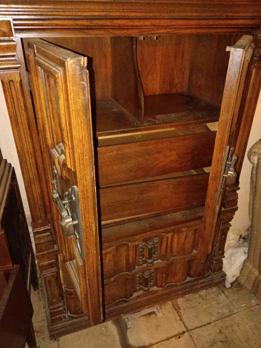 antique wooden cabinet with decorative designs