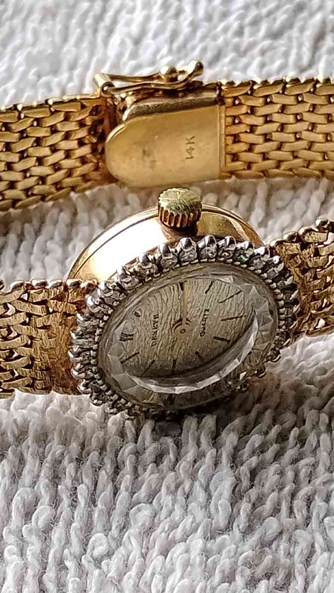 14 karat gold diamond Geneva quartz watch for ladies