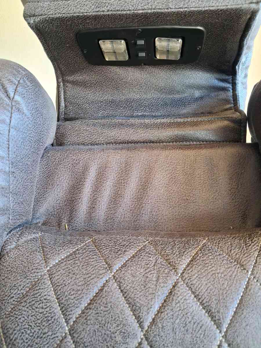 Brown suede couch the middle saint has a not lot in the midd