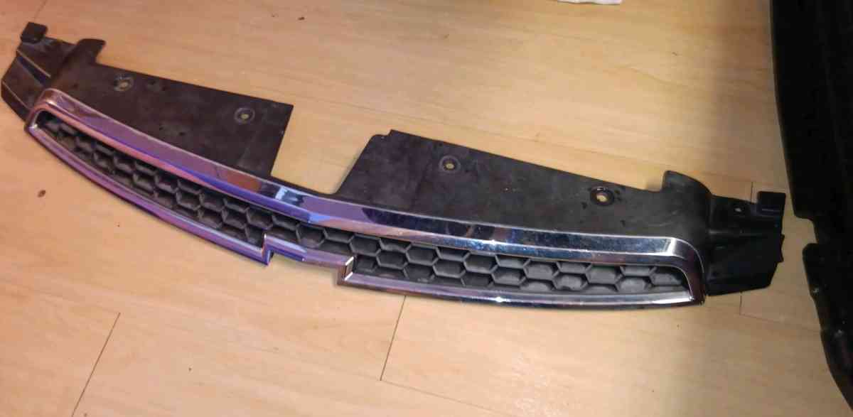 OEM GM Chevy Cruze front grill and shock absorber