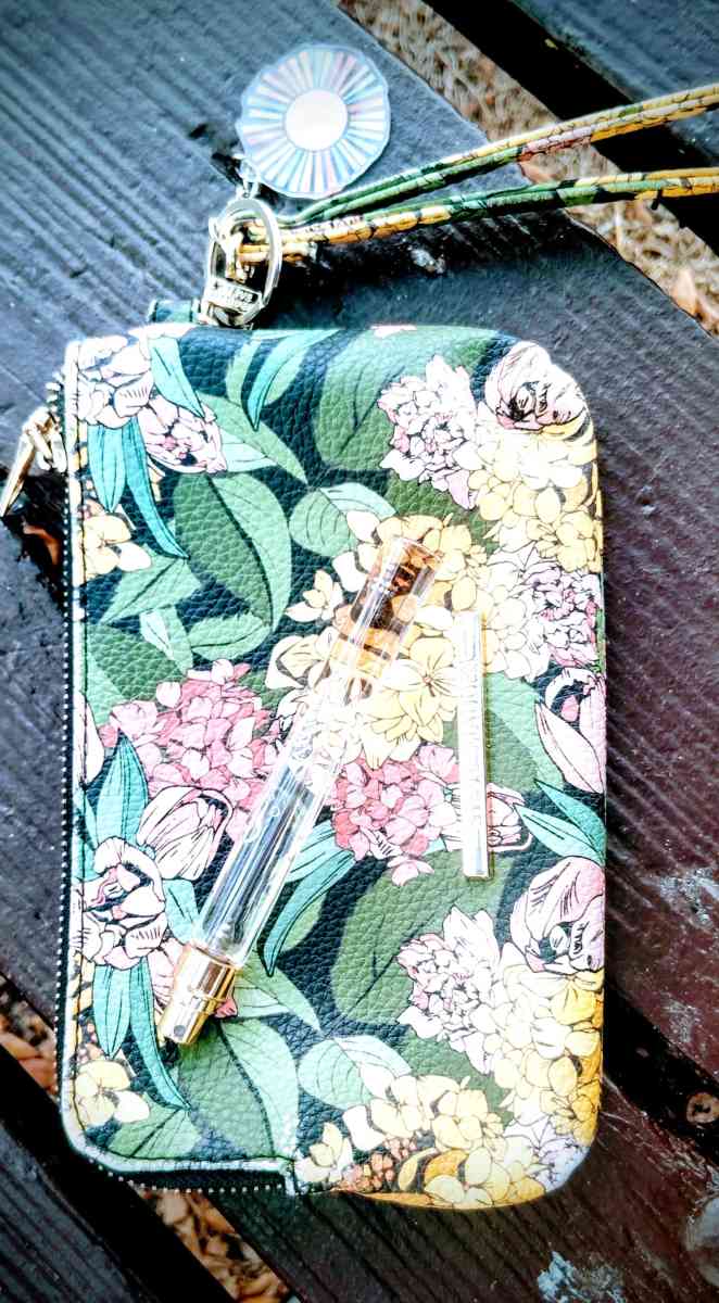 Steve Madden Cosmetic Purse With Free Bottle Of Gucci Perfum