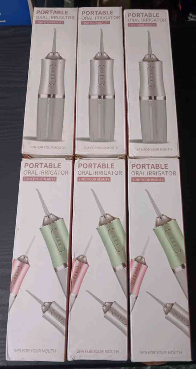 PORTABLE ORAL IRRIGITORS