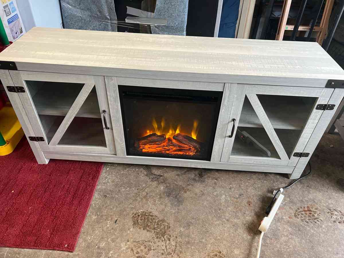 mueble para TV y chimenea en buen estado