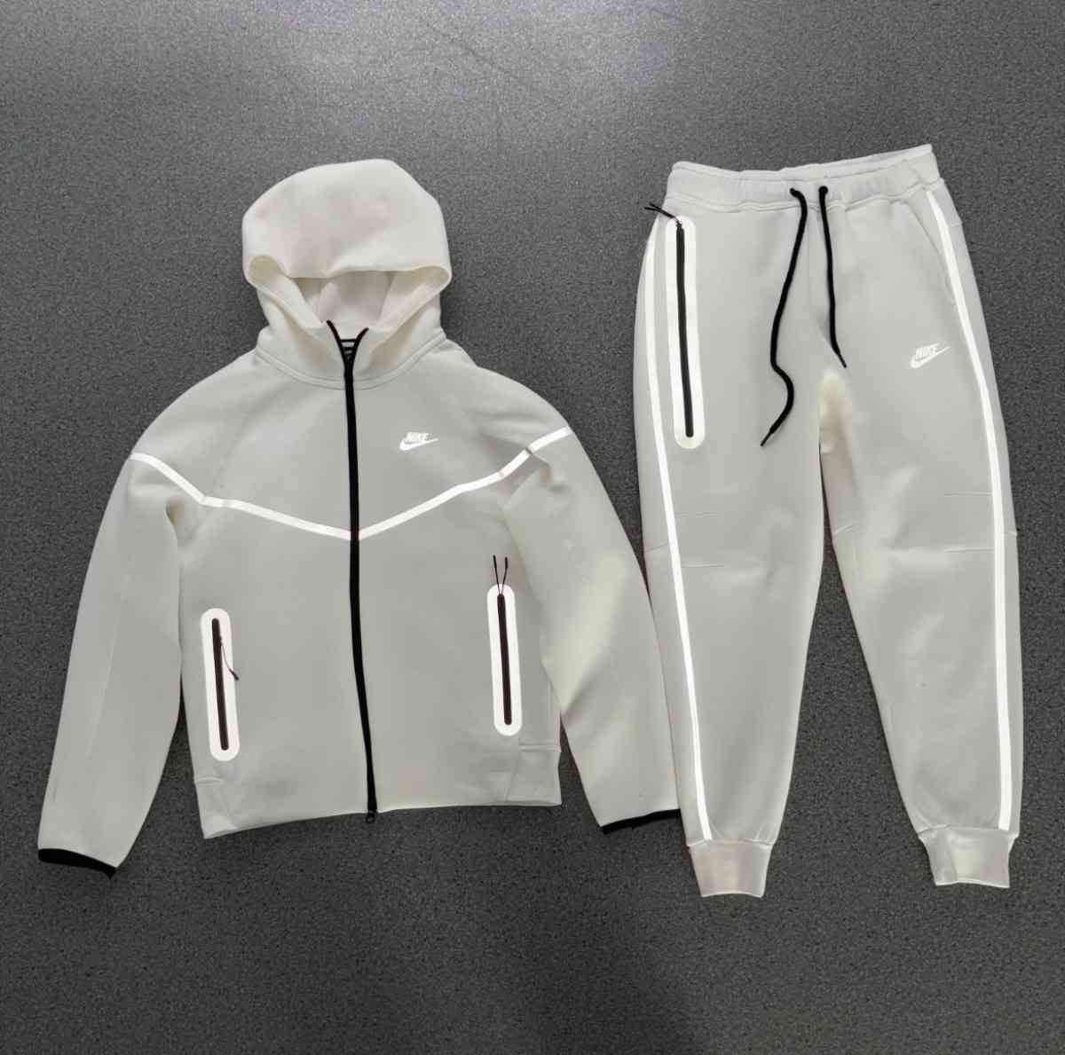 white Nike tech reflective