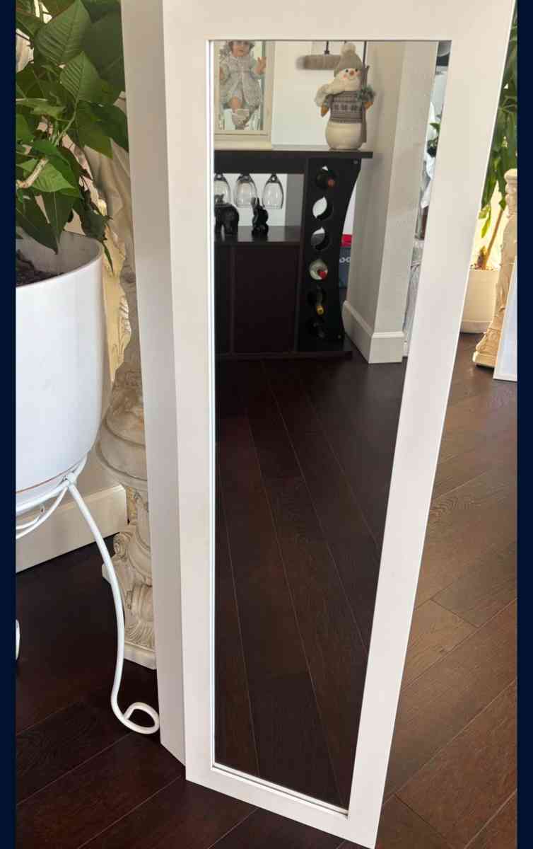 mirror with jewelry storage