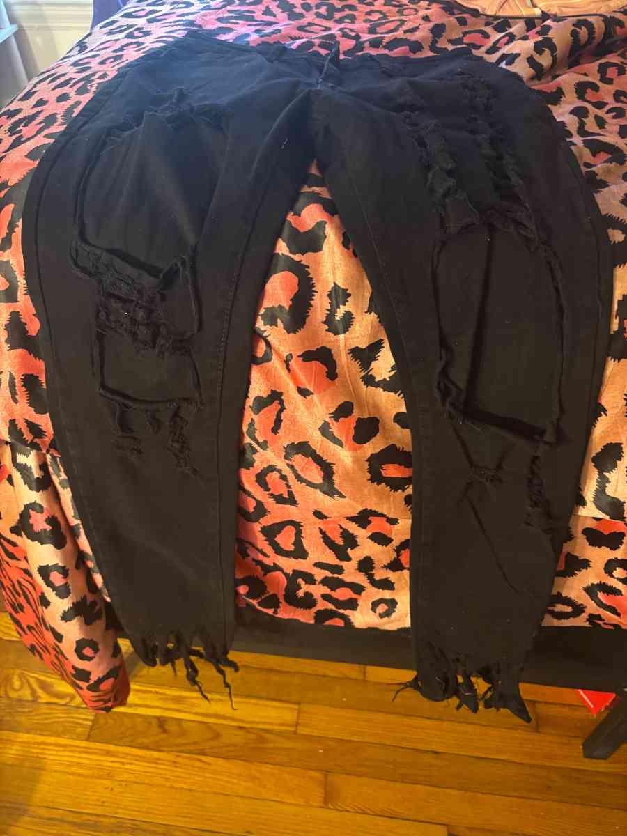 brand new black cut jeans