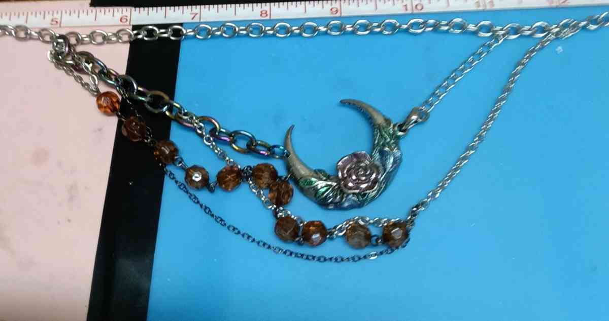 multiple chains moon stars and brown accent beads