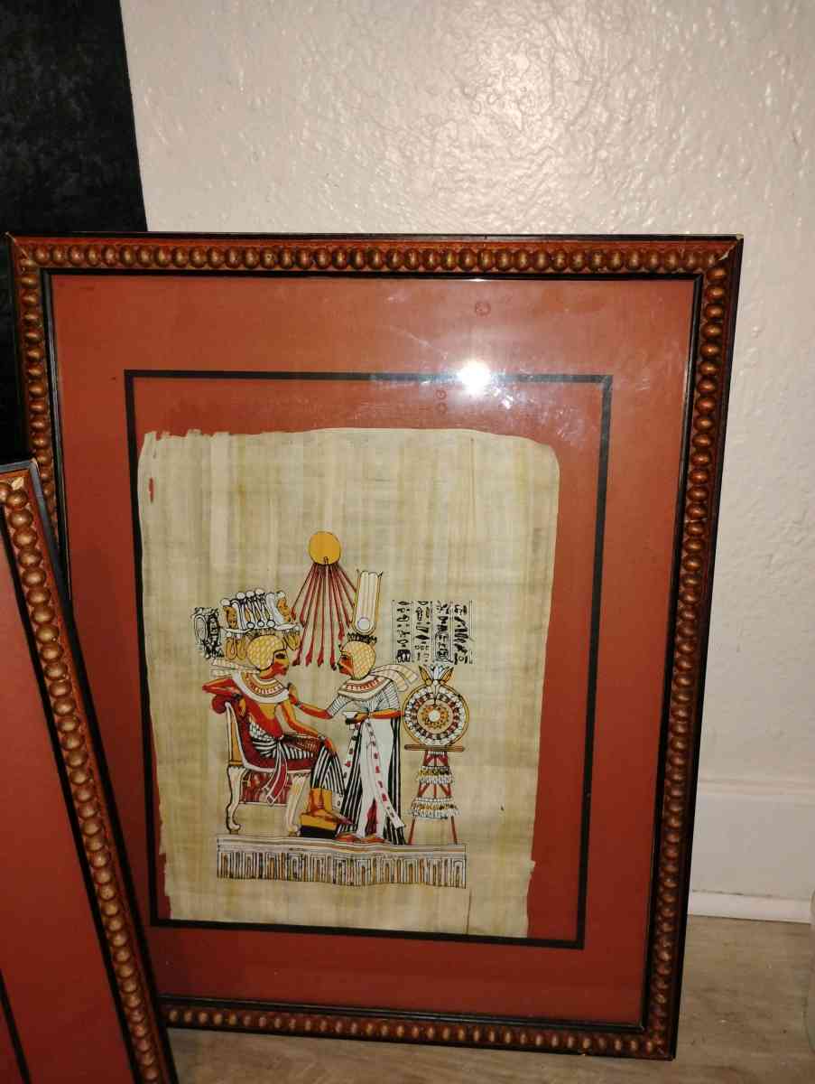 a set of 4 framed Egyptian pictures