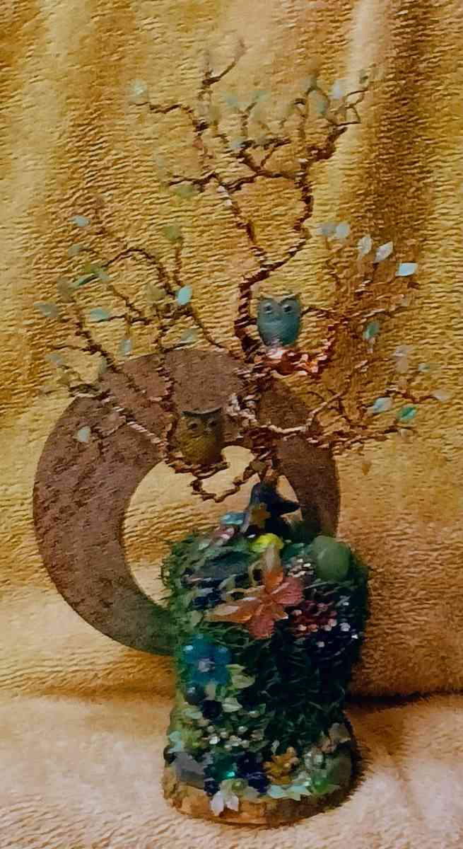 twisted copper tree with two owls