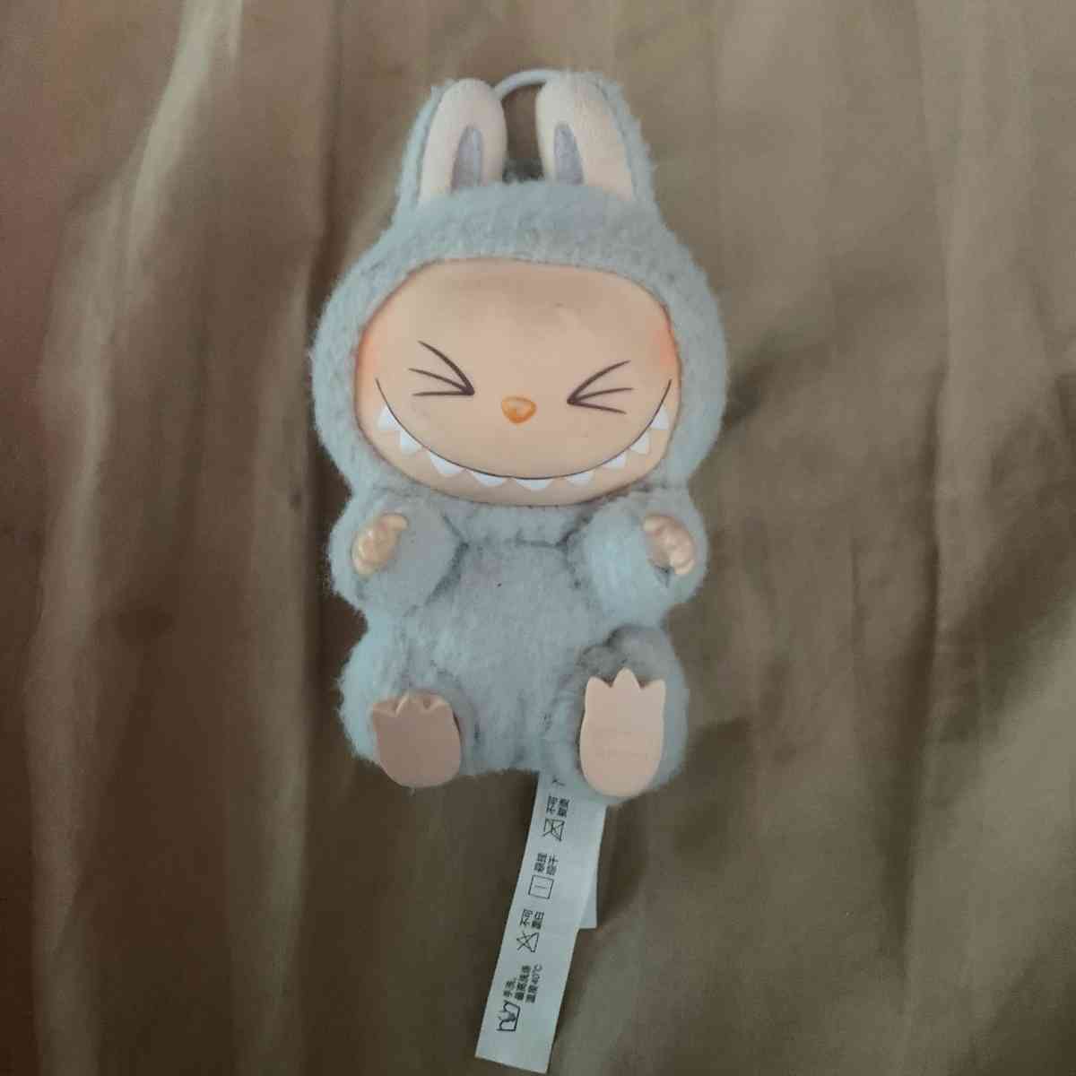 labubu gray have a seat