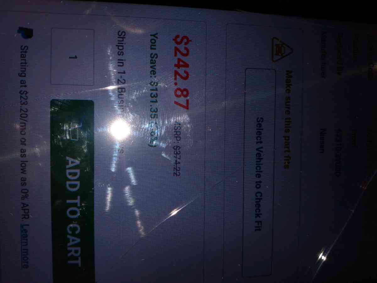 Nissan clip on front bumper sign